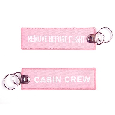 Breloczek do kluczy Remove Before Flight różowy
