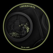 Srebrna moneta 5$ Czarnobyl fluoroscencja 2
